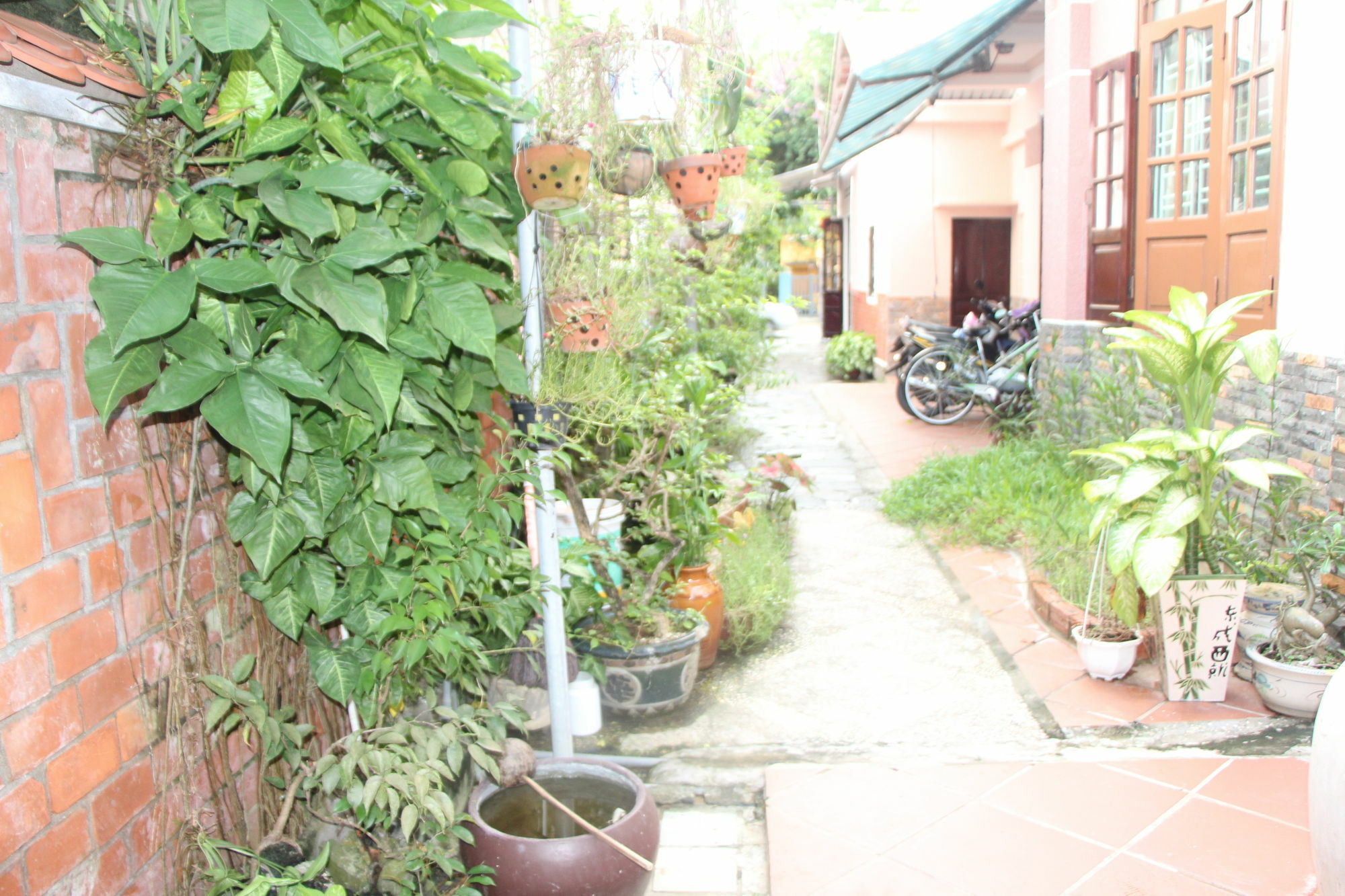 Red Ceramics Homestay Хойан Экстерьер фото
